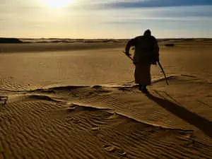 Arab Man Silhouette In Desert