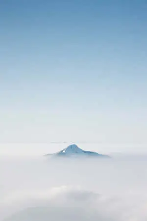 Blue Aesthetic Background Mountain Through The Clouds