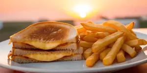 Burger and fries at sunset