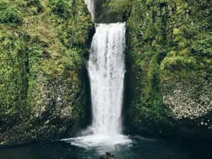 Captivating Waterfall Amidst Tranquil Greens