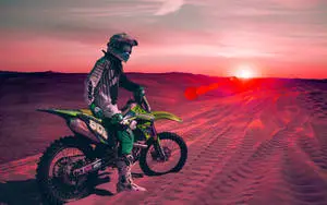 Cool Bike Rider On a Desert At Sunset