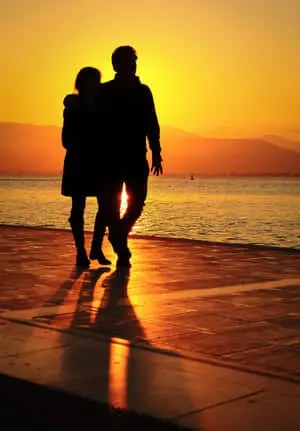 Couple At Beach Sunset Silhouette