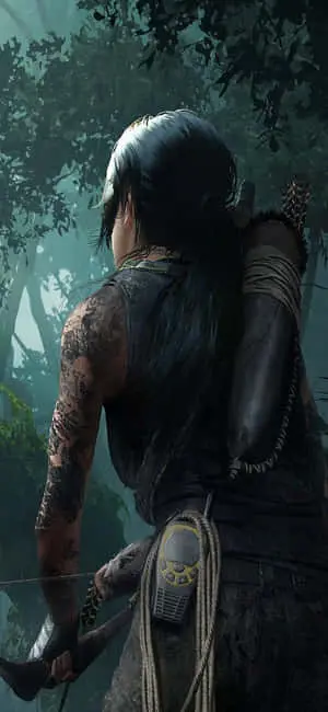 a woman with a bow in the forest