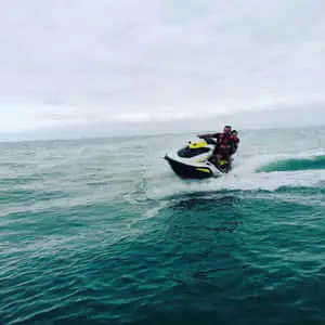 Adventurous Couple Enjoying a Jet Ski Ride