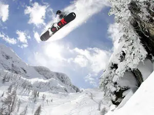 Man With A Snowboard Worm's Eye View 