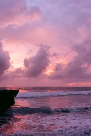 Pink Beach Sunset With Heavy Waves