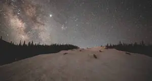 Starry_ Night_ Over_ Snowy_ Mountain
