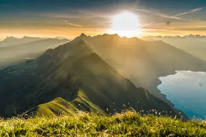 Sunrise_ Over_ Mountain_ Ridge_ Lake_ View