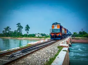 Tranquil Train Journey by The River