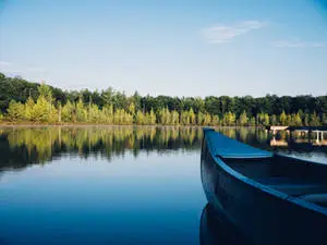 Translucent Lake With Boat