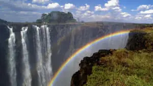Victoria Falls With A Half Rainbow